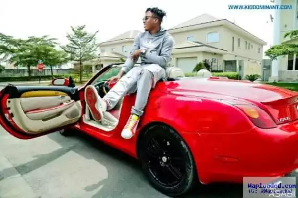 Photos: Superstar Producer, Kiddominant, Acquires Luxury Automobile